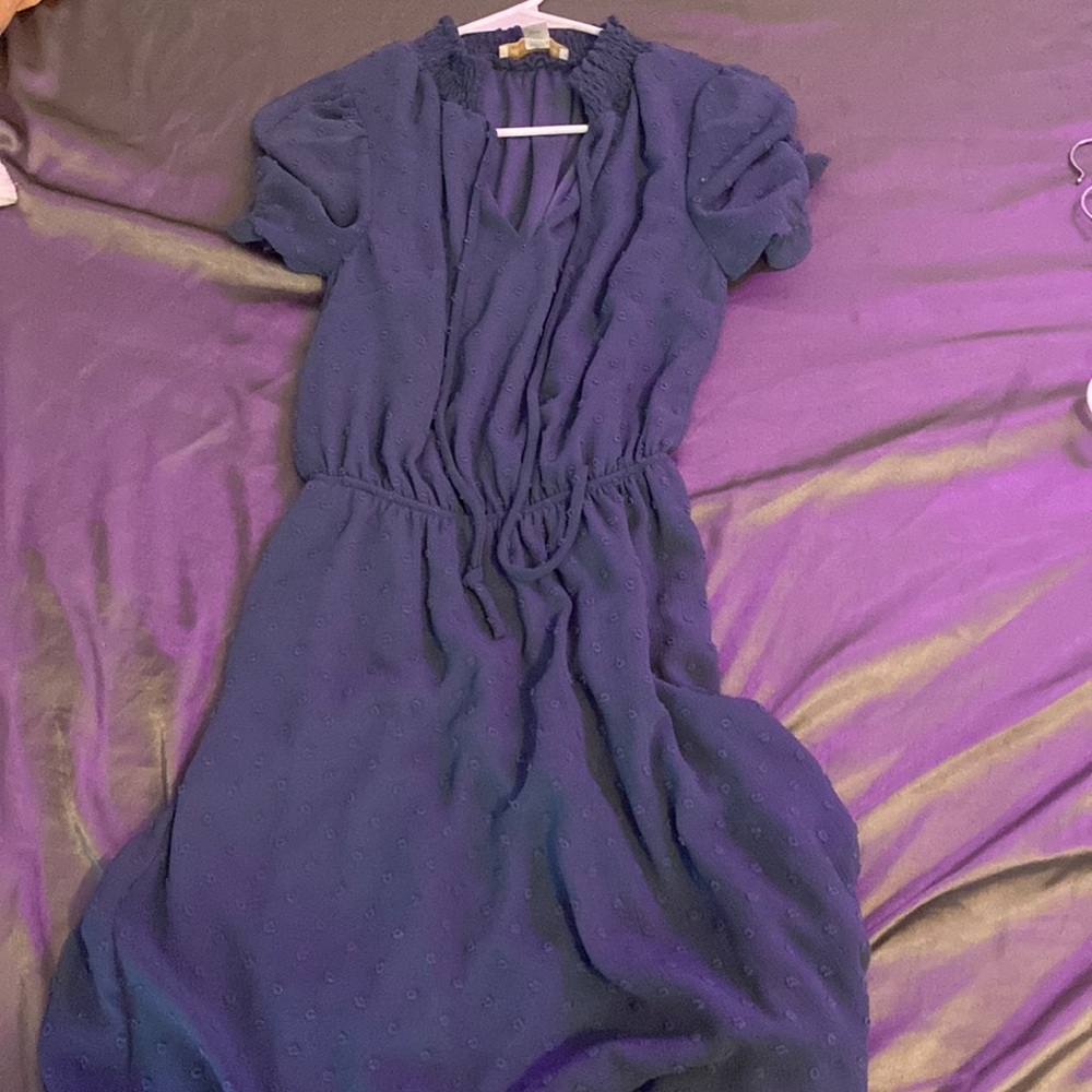 knee length dress with puff sleeves, tie front, and small turtle neck